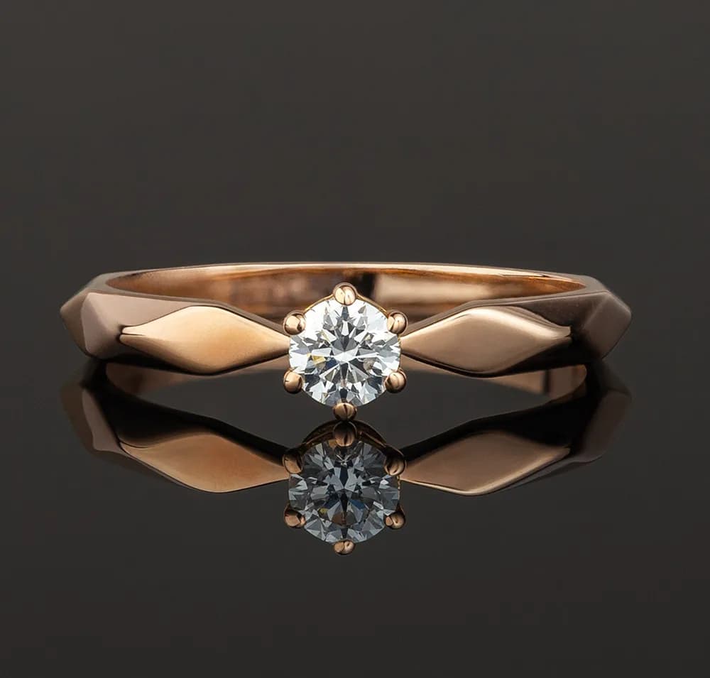 Каблучка з діамантом "Грані кохання" з червоного золота R11 3,6 018 (17,3)