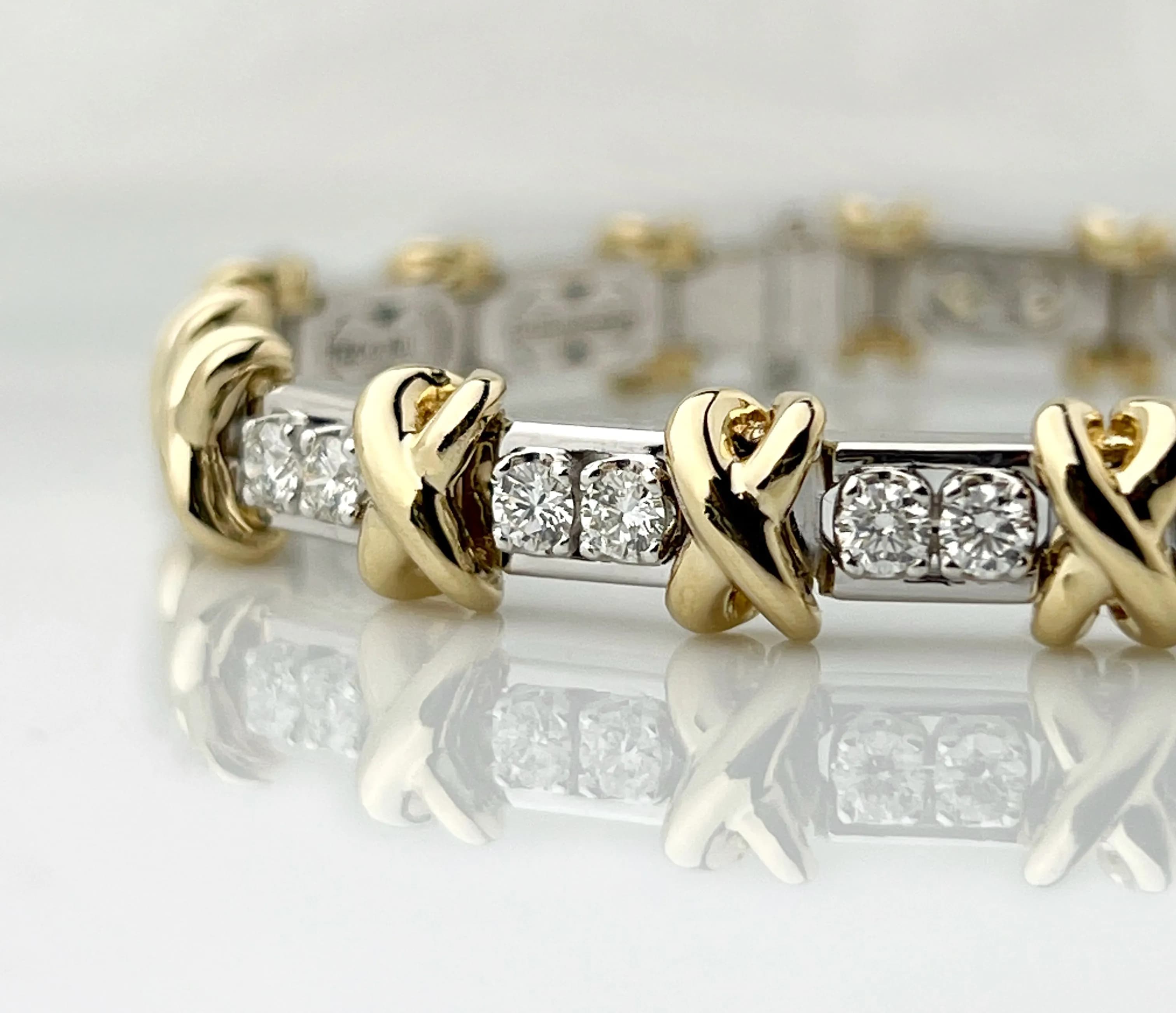 Браслет з діамантами "Criss Cross" з комбінованого золота