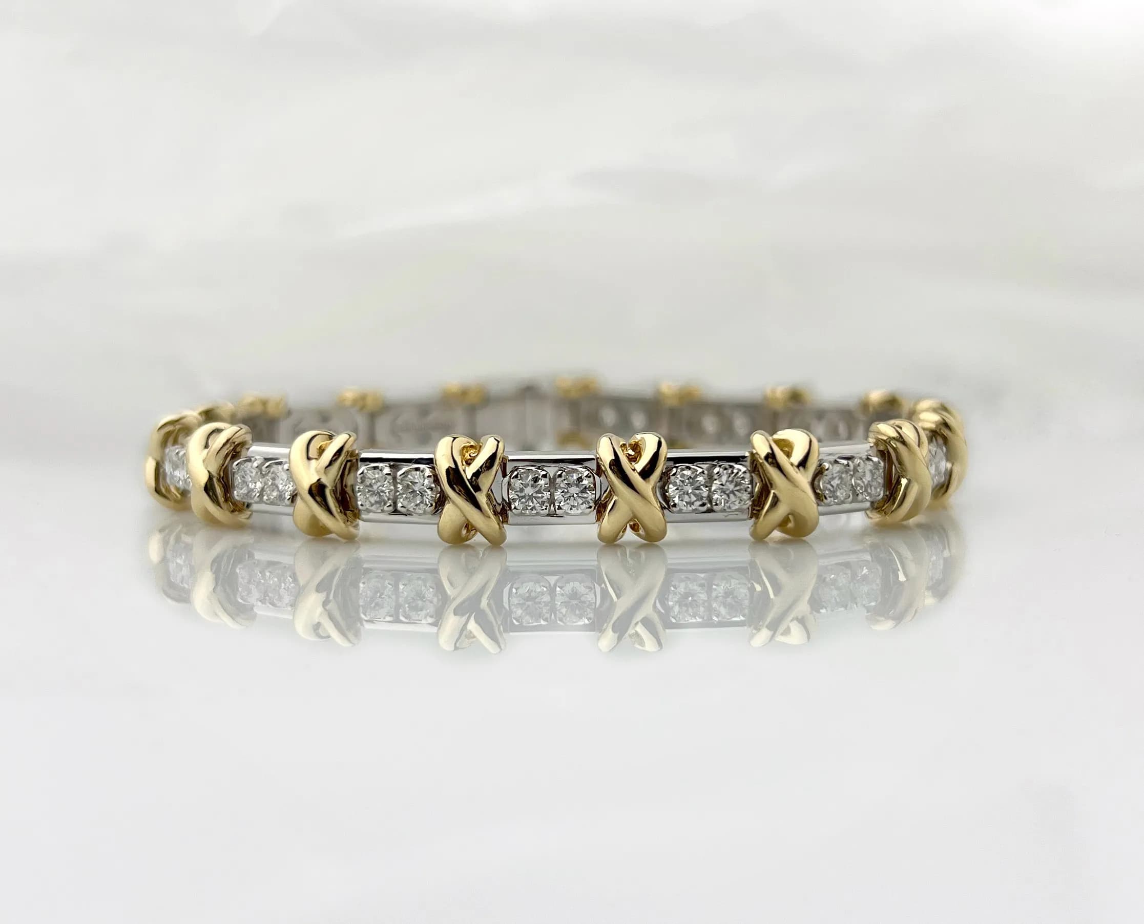 Браслет з діамантами "Criss Cross" з комбінованого золота