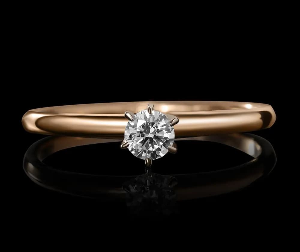 Каблучка з діамантом  ``Diamond`s forever`` з комбінованого золота 313-0379 (17,5)